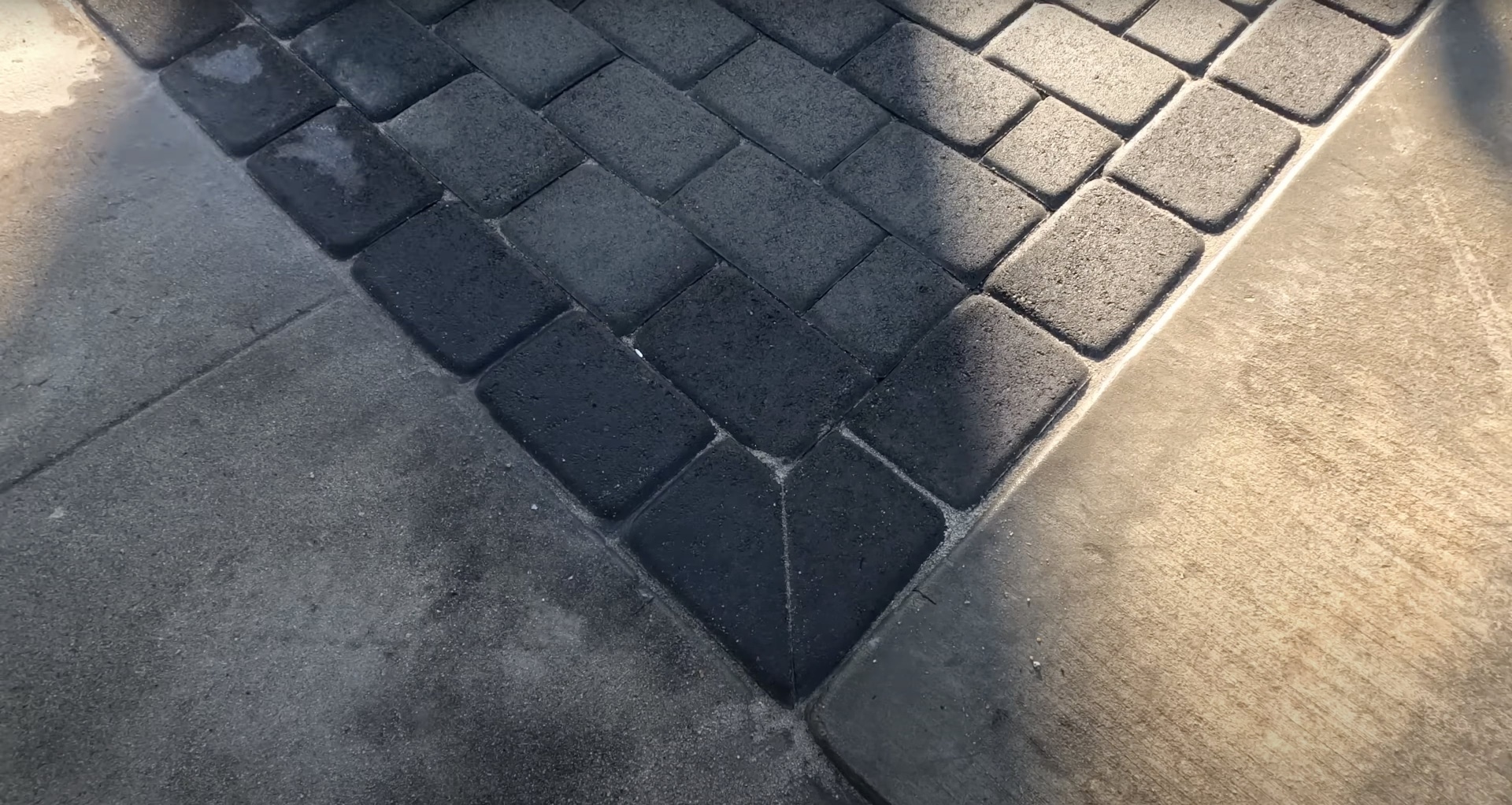 Professional concrete paver installation with custom geometric patterns Decorative concrete paver installation with geometric pattern design
